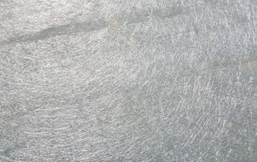 Over Finlarg laminate fibreglass or shingles?